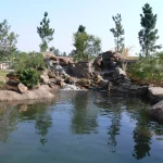 Pond with custom rock feature